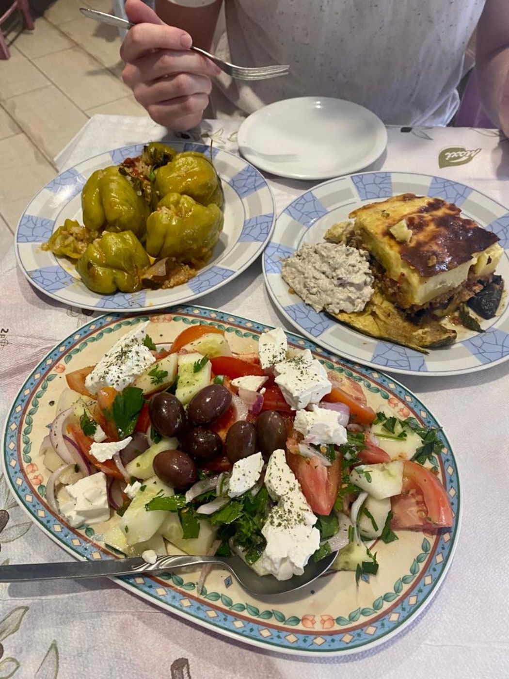 Moussaka, greek salad and stuff peppers.